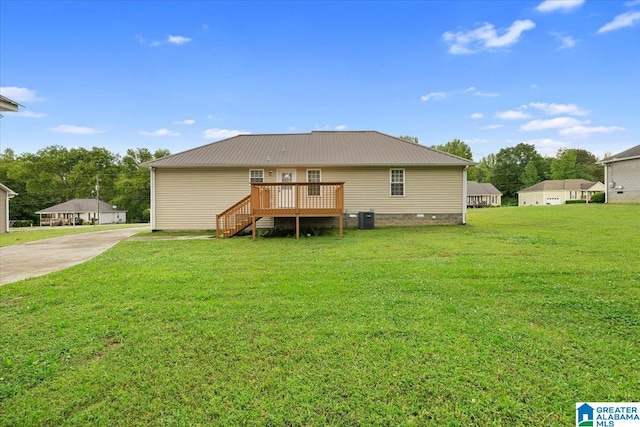 201 Hidden Meadows Dr, Hayden, AL 35079 - back of house with a wooden deck, a yard, central AC unit, metal roof, and stairs