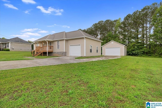 201 Hidden Meadows Dr, Hayden, AL 35079 - ranch-style home featuring a front yard, an outbuilding, covered porch, and a garage