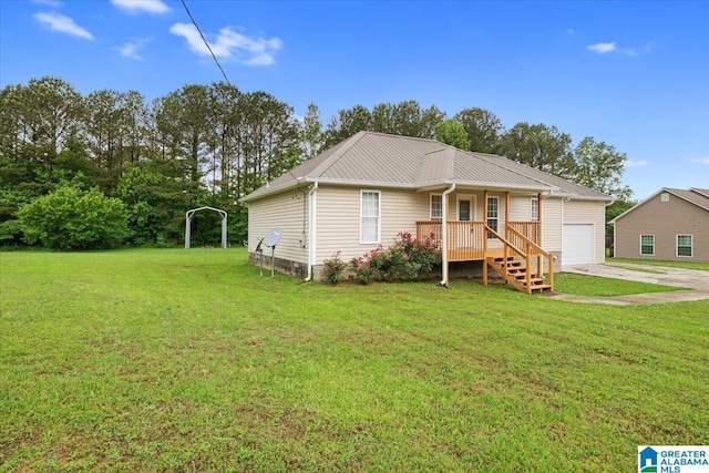 201 Hidden Meadows Dr, Hayden, AL 35079 - ranch-style house with an attached garage, driveway, a front lawn, and metal roof