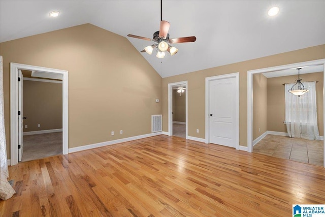 201 Hidden Meadows Dr, Hayden, AL 35079 - unfurnished bedroom with light wood-style flooring, ceiling fan, baseboards, and high vaulted ceiling
