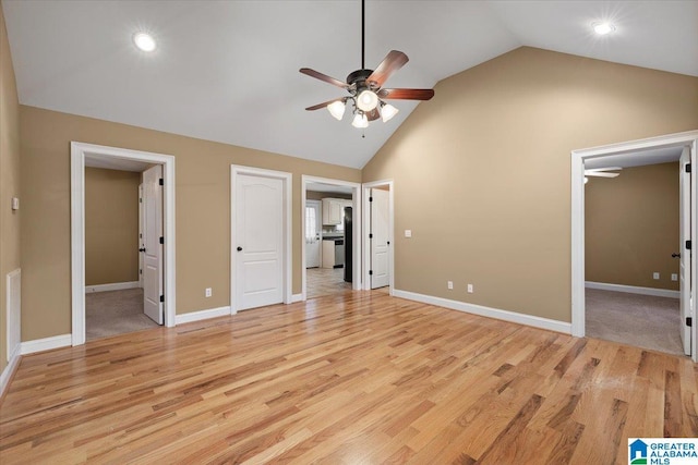 201 Hidden Meadows Dr, Hayden, AL 35079 - unfurnished bedroom featuring light wood-type flooring, ensuite bathroom, high vaulted ceiling, baseboards, and recessed lighting