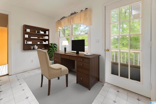 1201 Devonshire Dr NE, Jacksonville, AL 36265 - office with healthy amount of natural light and light tile patterned floors