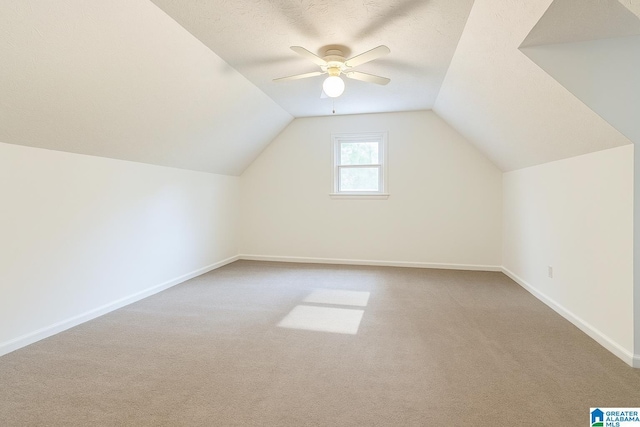 1201 Devonshire Dr NE, Jacksonville, AL 36265 - bonus room featuring carpet, a ceiling fan, baseboards, and lofted ceiling