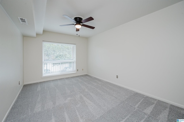 unfurnished room featuring carpet, baseboards, and ceiling fan