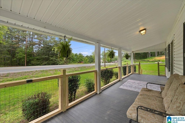 1034 Valley Rd, Oneonta, AL 35121 - unfurnished sunroom with lofted ceiling