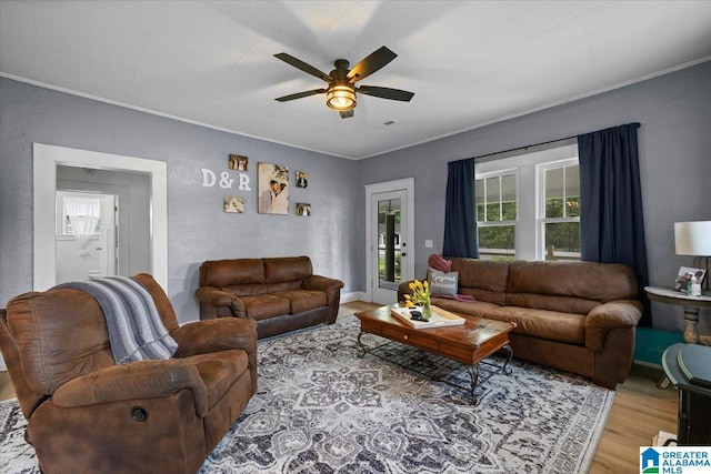 1034 Valley Rd, Oneonta, AL 35121 - living area with light wood-type flooring, a ceiling fan, and crown molding