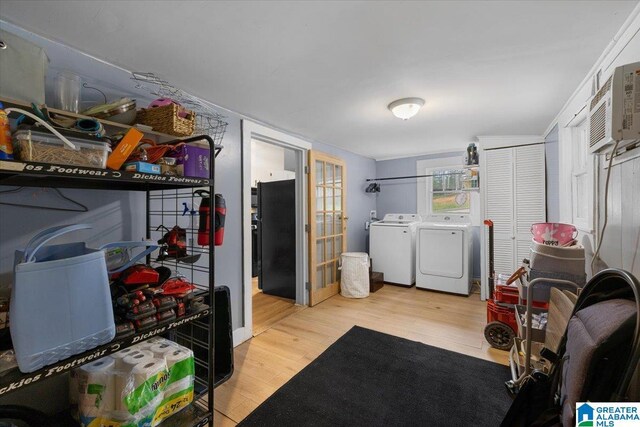 1034 Valley Rd, Oneonta, AL 35121 - laundry room with washer and clothes dryer and light wood finished floors
