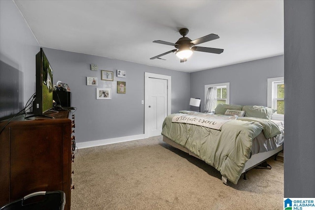 1034 Valley Rd, Oneonta, AL 35121 - carpeted bedroom with ceiling fan and baseboards