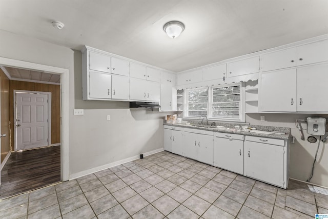 kitchen featuring open shelves, a sink, white cabinetry, under cabinet range hood, and baseboards