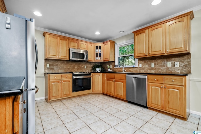 2673 Buckboard Rd, Birmingham, AL 35244 - kitchen with appliances with stainless steel finishes, dark countertops, ornamental molding, backsplash, and light tile patterned floors