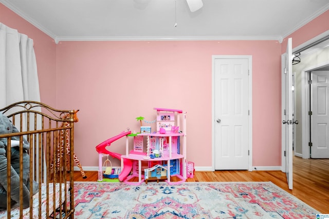 2673 Buckboard Rd, Birmingham, AL 35244 - bedroom with ornamental molding, wood finished floors, baseboards, and a ceiling fan