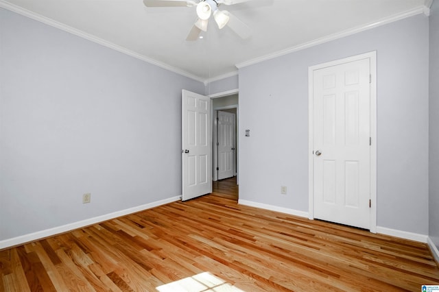 2673 Buckboard Rd, Birmingham, AL 35244 - unfurnished bedroom featuring crown molding, light wood finished floors, baseboards, and ceiling fan