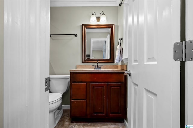 2673 Buckboard Rd, Birmingham, AL 35244 - bathroom featuring toilet, crown molding, vanity, and baseboards