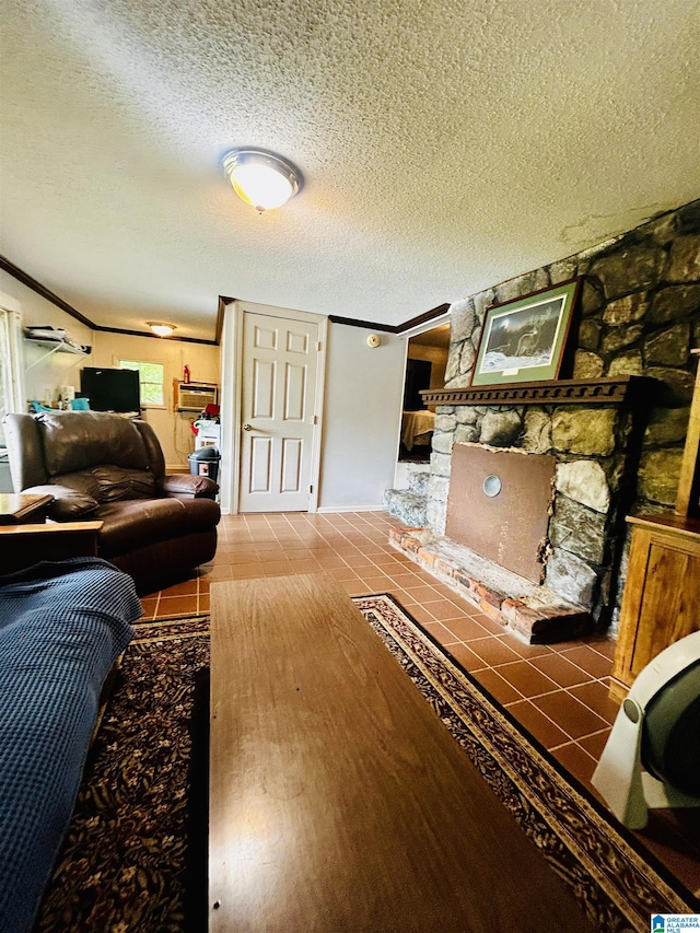 1 Annie Humber Rd, Adger, AL 35006 - living room featuring a textured ceiling, crown molding, a wood stove, and tile patterned floors