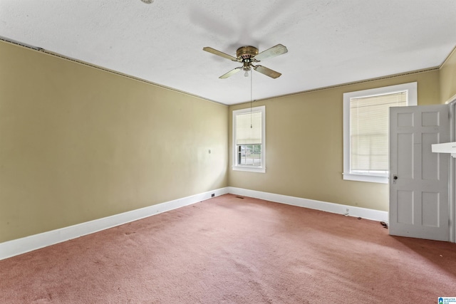 315 W Parkway Ave, Talladega, AL 35160 - carpeted empty room featuring a ceiling fan and baseboards