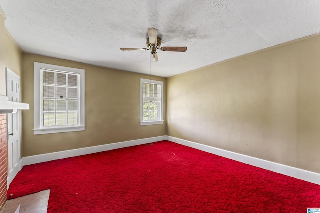 315 W Parkway Ave, Talladega, AL 35160 - unfurnished room featuring ceiling fan, healthy amount of natural light, carpet floors, and a textured ceiling
