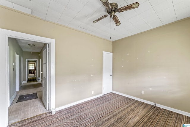 315 W Parkway Ave, Talladega, AL 35160 - spare room with carpet flooring, a ceiling fan, and baseboards