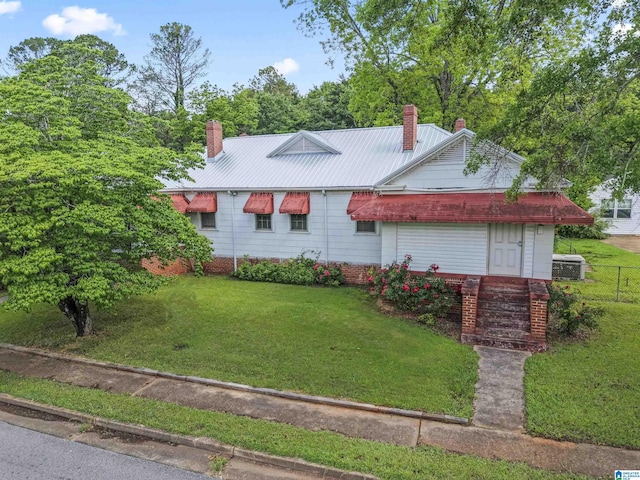 315 W Parkway Ave, Talladega, AL 35160 - ranch-style house with a chimney