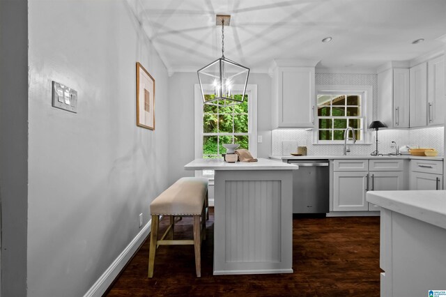 2208 Garland Dr, Vestavia Hills, AL 35216 - kitchen featuring dishwasher, dark wood-type flooring, tasteful backsplash, and healthy amount of natural light