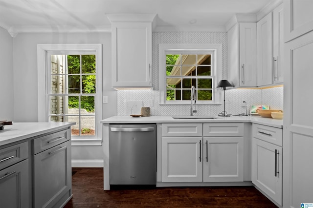 2208 Garland Dr, Vestavia Hills, AL 35216 - kitchen with dishwasher, a sink, crown molding, light countertops, and tasteful backsplash