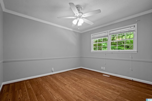 2208 Garland Dr, Vestavia Hills, AL 35216 - empty room featuring wood finished floors, baseboards, a ceiling fan, and ornamental molding