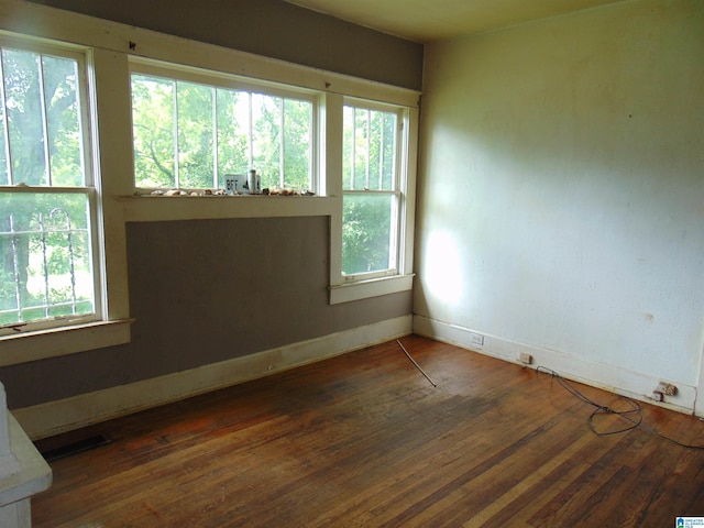 1608 N 19th St, Birmingham, AL 35234 - spare room with wood finished floors and plenty of natural light