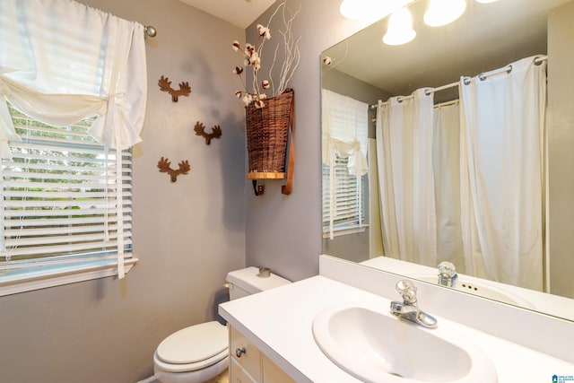 1834 Brandon Way, Bessemer, AL 35022 - bathroom featuring vanity, toilet, and a shower with shower curtain