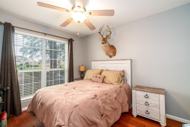 1834 Brandon Way, Bessemer, AL 35022 - bedroom with dark wood-style flooring, ceiling fan, and baseboards