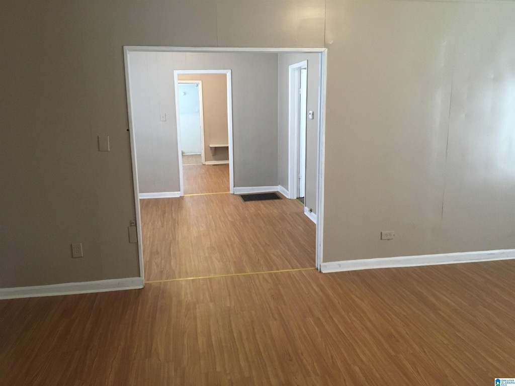 1308 Sloan Ave, Tarrant, AL 35217 - unfurnished room with wood finished floors and baseboards
