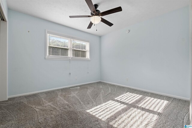 402 S 8th St, Gadsden, AL 35901 - carpeted empty room with a ceiling fan and baseboards