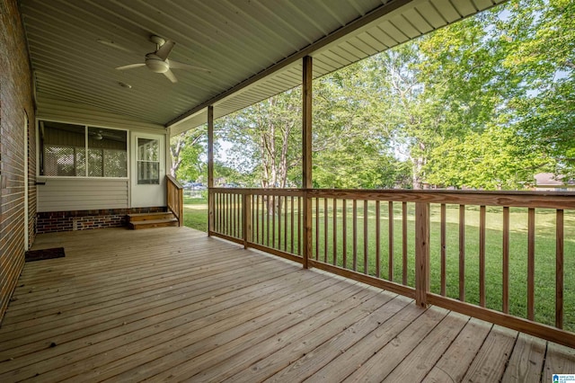 402 S 8th St, Gadsden, AL 35901 - deck with a ceiling fan, a yard, and a sunroom