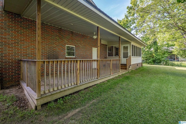 402 S 8th St, Gadsden, AL 35901 - view of side of property featuring brick siding, a yard, a deck, and crawl space