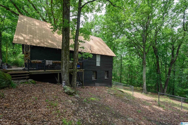 4410 S Shades Crest Rd, Helena, AL 35022 - rear view of house featuring fence, a wooden deck, and metal roof