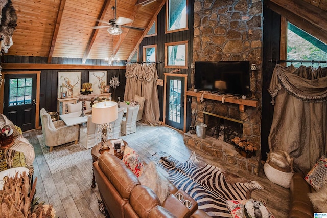 4410 S Shades Crest Rd, Helena, AL 35022 - living area featuring wood ceiling, wood-type flooring, a fireplace, beamed ceiling, and ceiling fan