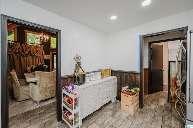 4410 S Shades Crest Rd, Helena, AL 35022 - bedroom with a wainscoted wall, wood finished floors, freestanding refrigerator, and recessed lighting