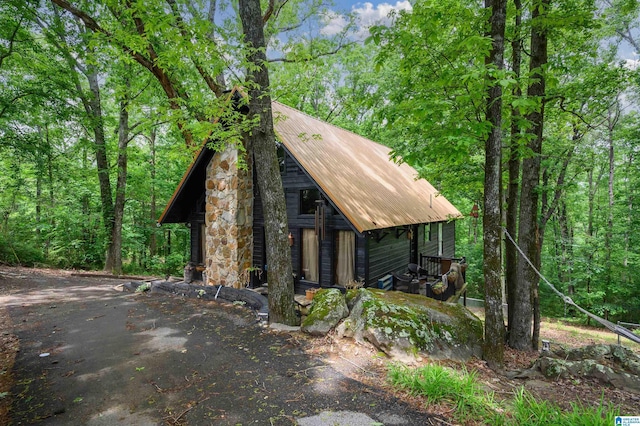 4410 S Shades Crest Rd, Helena, AL 35022 - view of front of property featuring metal roof and a forest view