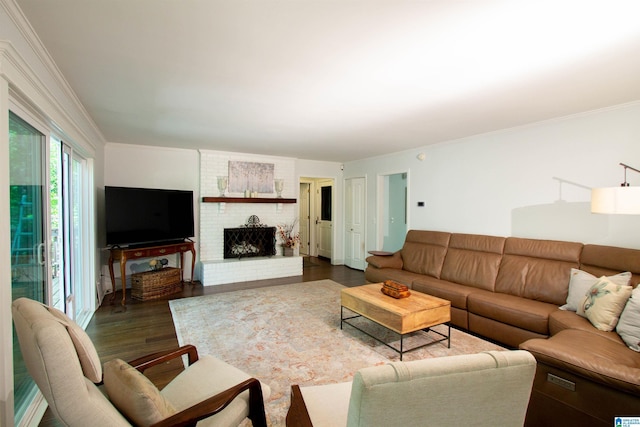 2009 Crossvine Rd, Hoover, AL 35244 - living room with dark wood finished floors, ornamental molding, and a fireplace