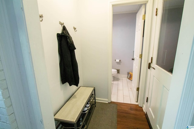 2009 Crossvine Rd, Hoover, AL 35244 - mudroom with baseboards, dark wood finished floors, and crown molding