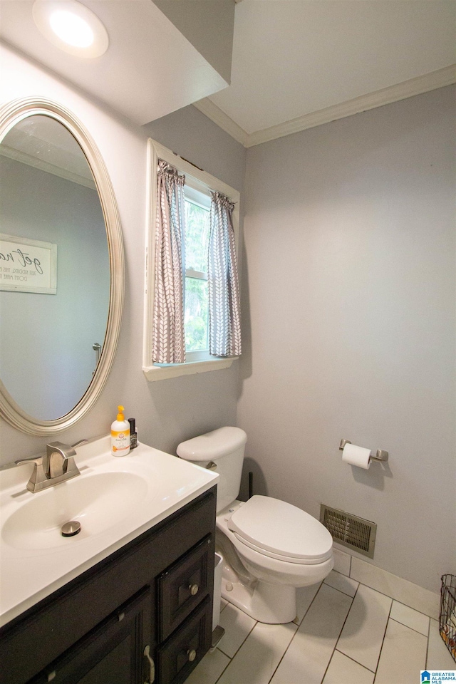 2009 Crossvine Rd, Hoover, AL 35244 - half bathroom featuring ornamental molding, toilet, and vanity