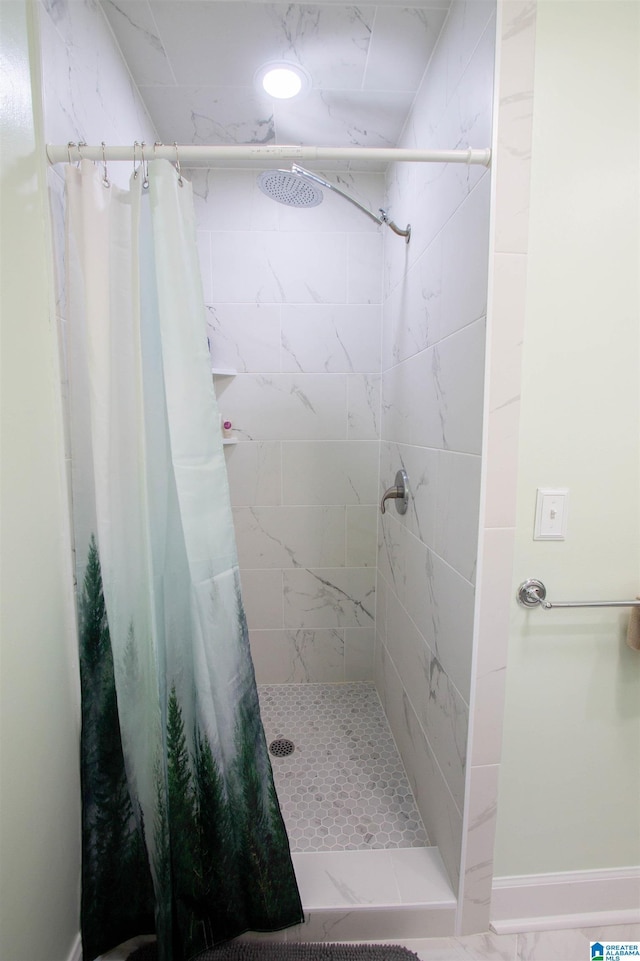 2009 Crossvine Rd, Hoover, AL 35244 - bathroom with a shower stall and marble finish floors