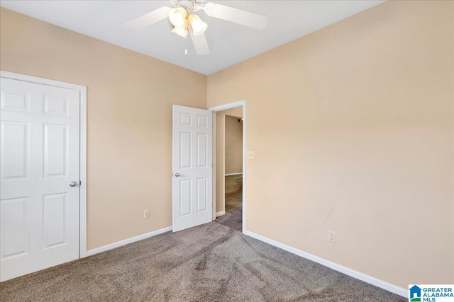 2250 Forest Lakes Ln, Sterrett, AL 35147 - unfurnished bedroom with carpet flooring, baseboards, and a ceiling fan