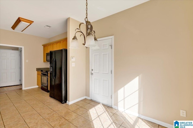 2250 Forest Lakes Ln, Sterrett, AL 35147 - kitchen featuring black appliances, light tile patterned floors, hanging light fixtures, and baseboards