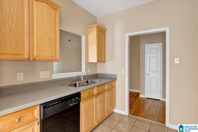 2250 Forest Lakes Ln, Sterrett, AL 35147 - kitchen featuring black dishwasher, a sink, light tile patterned floors, light brown cabinetry, and baseboards