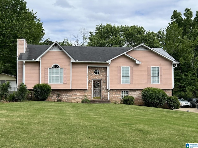 113 Fairlane Dr, Pleasant Grove, AL 35127 - raised ranch with a front yard and a chimney