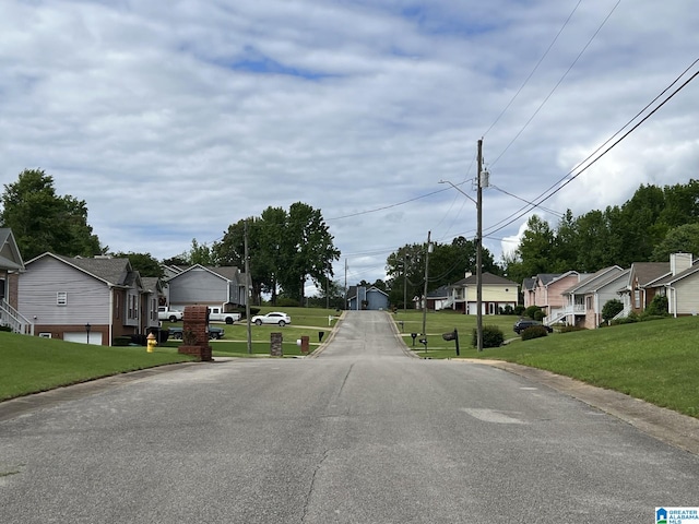 113 Fairlane Dr, Pleasant Grove, AL 35127 - view of asphalt road with a residential view, street lights, and curbs