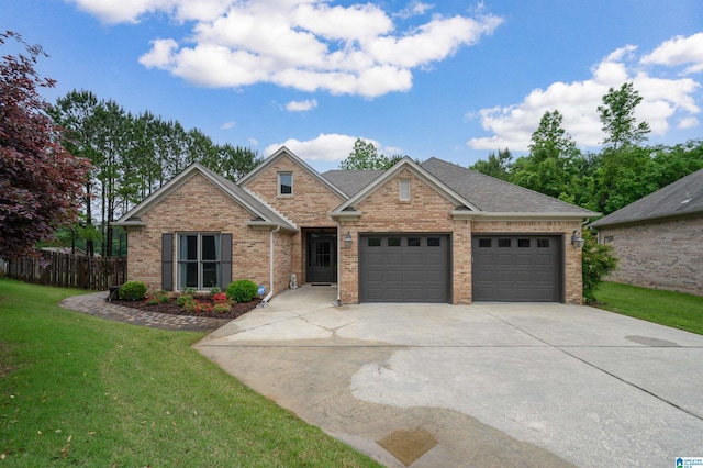 view of front of house featuring a garage, concrete driveway, and brick siding