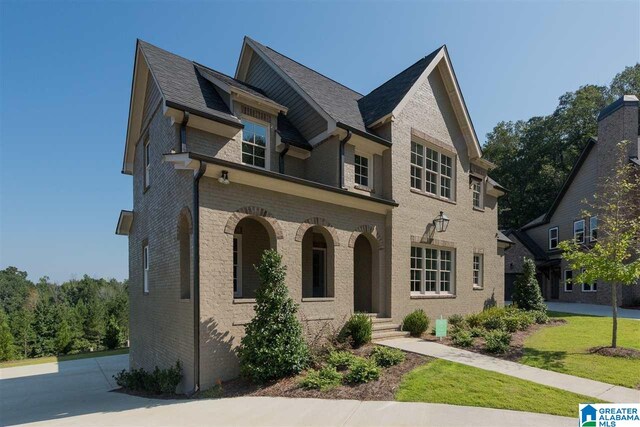 4731 Mcgill Ct, Hoover, AL 35226 - view of front facade featuring brick siding and a front yard