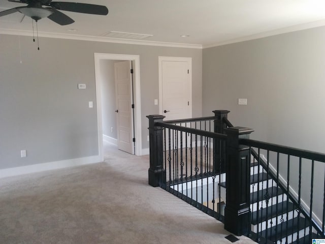 4731 Mcgill Ct, Hoover, AL 35226 - hallway with an upstairs landing, light colored carpet, ornamental molding, and baseboards
