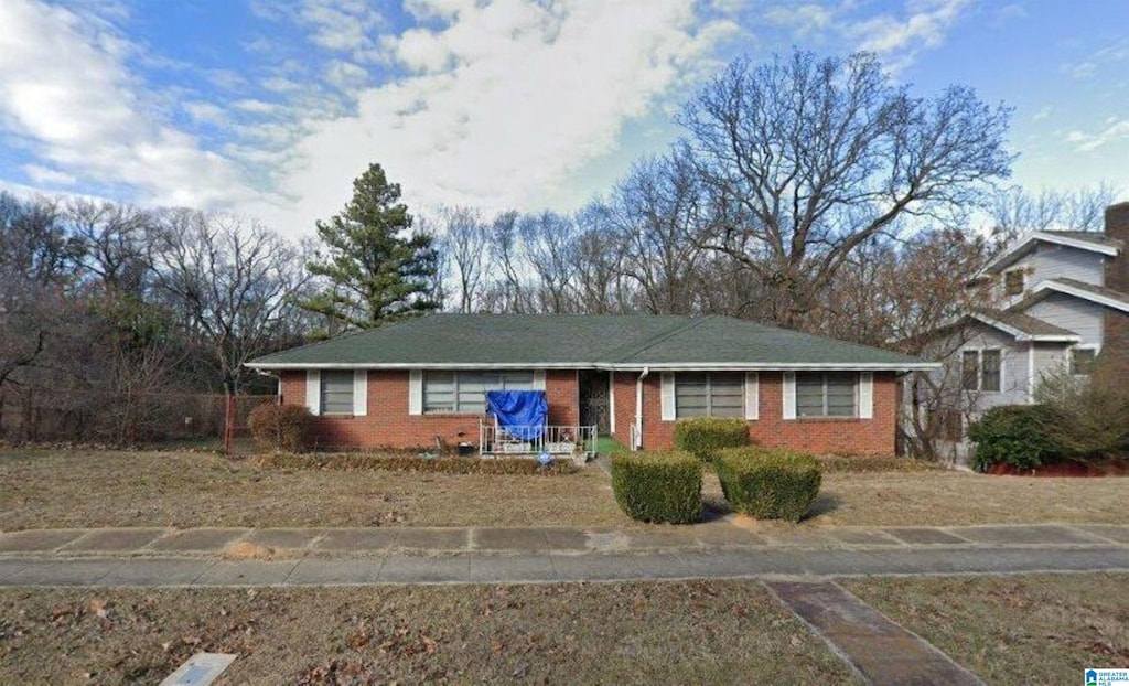 ranch-style home with brick siding