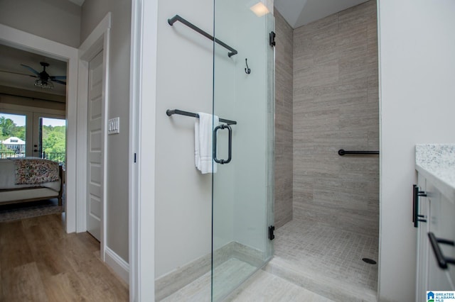 90 Landing Chase, Wedowee, AL 36278 - ensuite bathroom with ceiling fan, a shower stall, french doors, and wood finished floors